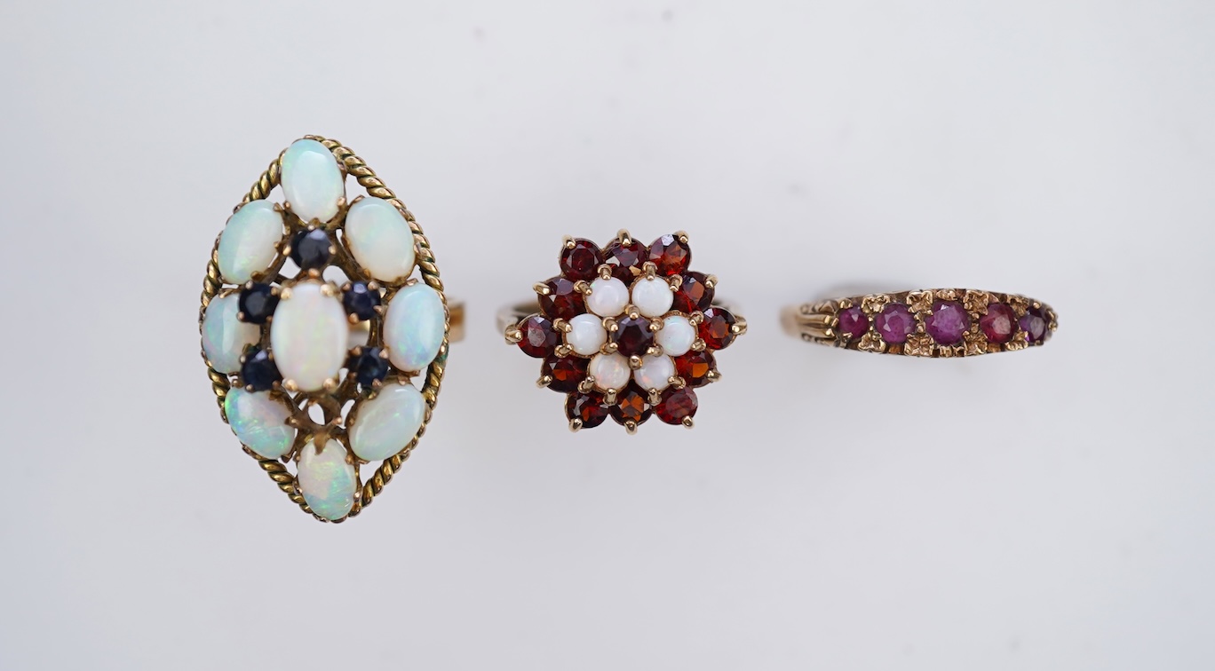 Three rings and a brooch
